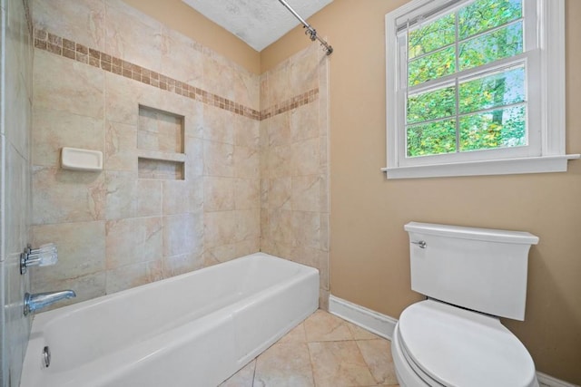 bathroom with baseboards, tile patterned flooring, a textured ceiling, bathing tub / shower combination, and toilet