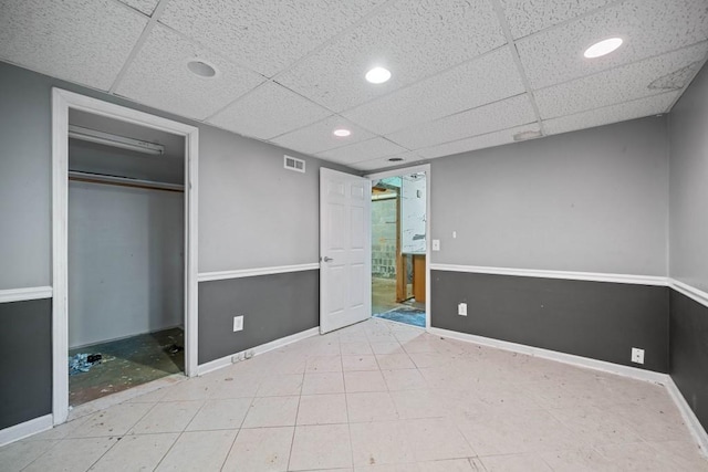 unfurnished bedroom featuring a closet, visible vents, recessed lighting, and baseboards