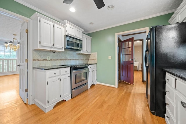 kitchen with white cabinetry, crown molding, light wood-type flooring, and stainless steel appliances