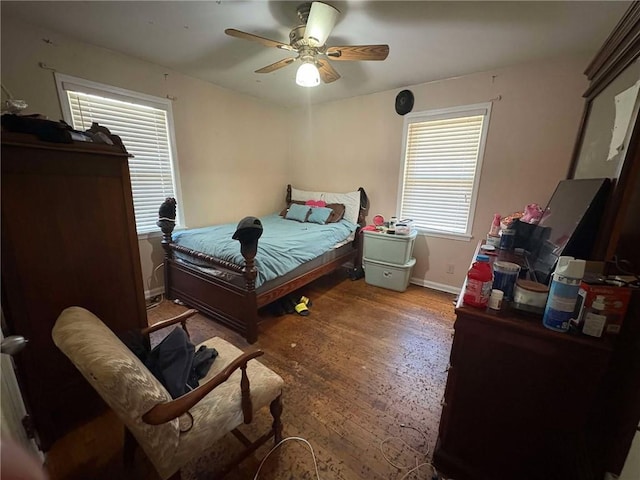 bedroom featuring ceiling fan and wood-type flooring