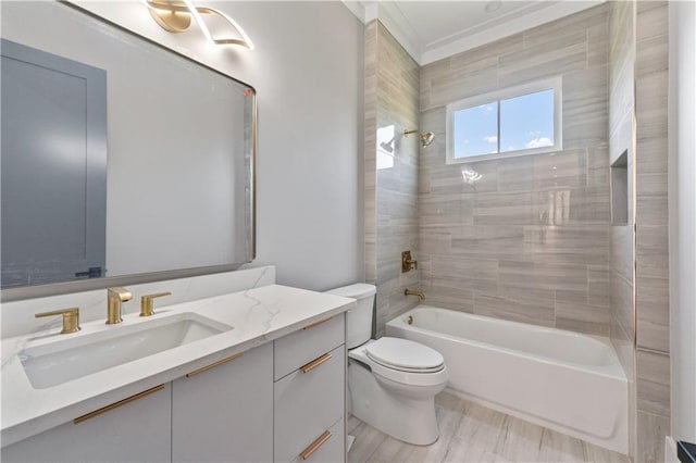 full bathroom with vanity, tiled shower / bath combo, and toilet