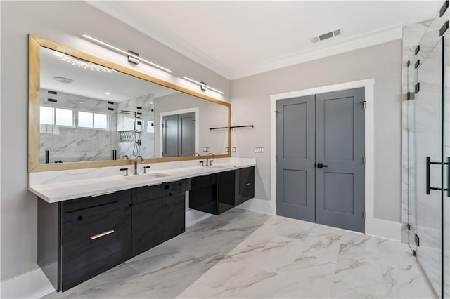 bathroom with vanity, an enclosed shower, and ornamental molding