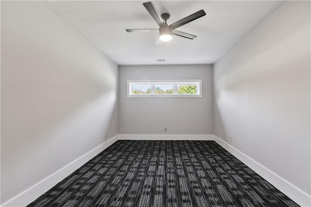 spare room with ceiling fan