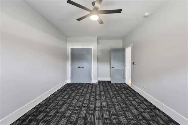 unfurnished bedroom with a closet and ceiling fan