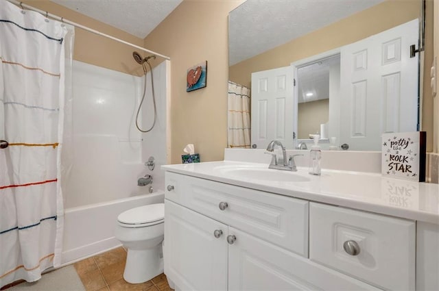 full bathroom with a textured ceiling, tile patterned floors, vanity, toilet, and shower / bath combo