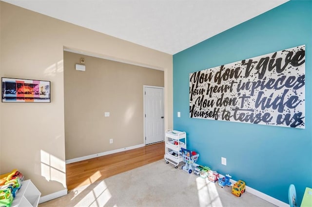 game room with carpet flooring