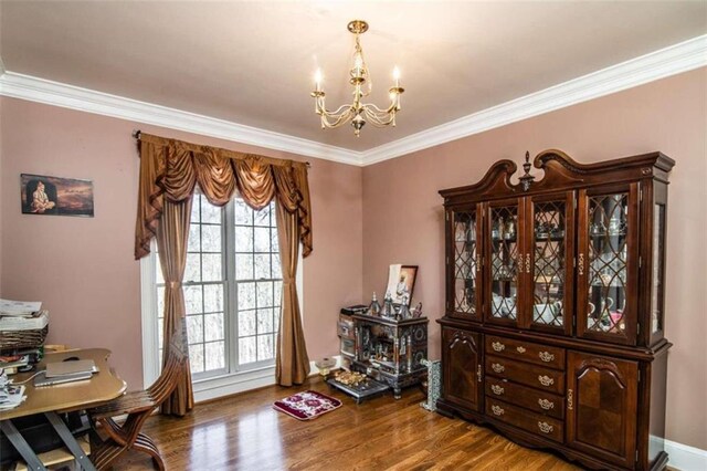 home office featuring ornamental molding, hardwood / wood-style flooring, and a chandelier