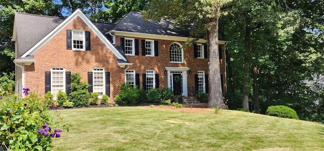 4971 Fairhaven Way NE, Roswell, GA 30075 - colonial-style house with a front yard and brick siding