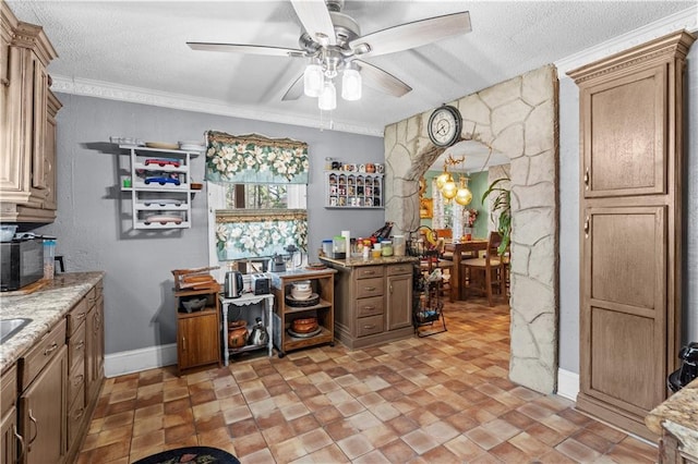 942 Hardwick Cir, Dalton, GA 30720 - bar with arched walkways, crown molding, a textured ceiling, baseboards, and ceiling fan with notable chandelier
