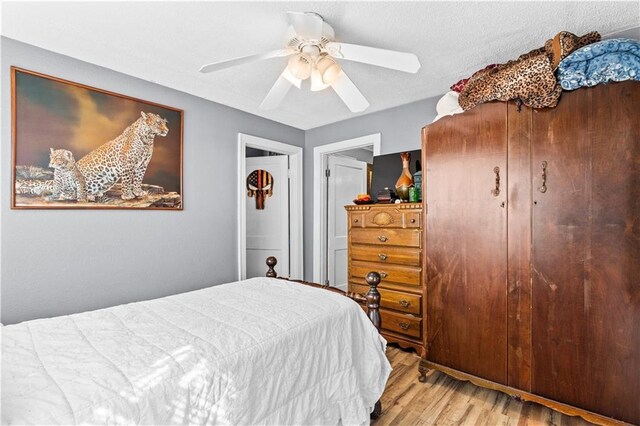 942 Hardwick Cir, Dalton, GA 30720 - bedroom with ceiling fan and wood finished floors