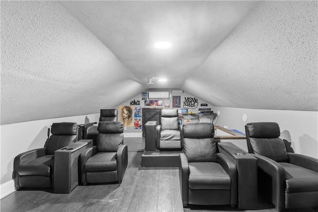 942 Hardwick Cir, Dalton, GA 30720 - cinema room with a textured ceiling, baseboards, vaulted ceiling, and wood finished floors