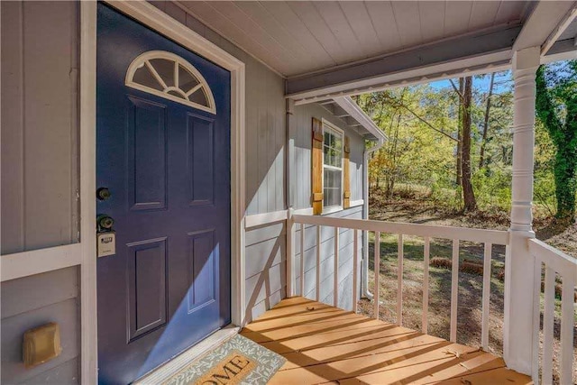 doorway to property with a porch