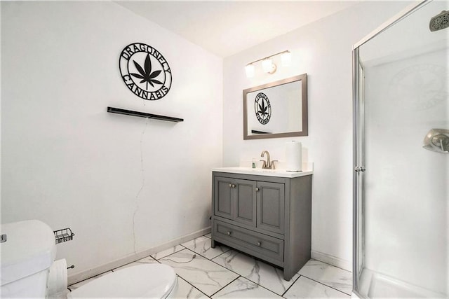 full bath featuring vanity, a stall shower, toilet, and marble finish floor