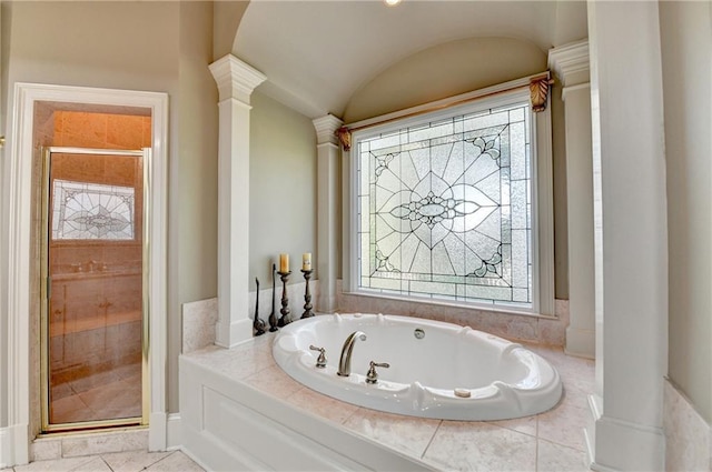 8455 Abingdon Ln, Duluth, GA 30097 - bathroom featuring a garden tub, a stall shower, lofted ceiling, ornate columns, and tile patterned floors