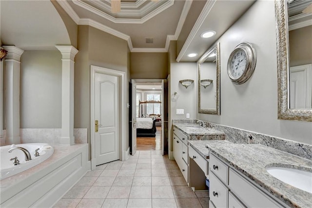 8455 Abingdon Ln, Duluth, GA 30097 - full bathroom featuring double vanity, ornamental molding, a bath, ensuite bathroom, and ornate columns