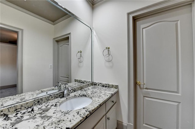 8455 Abingdon Ln, Duluth, GA 30097 - bathroom featuring vanity and ornamental molding
