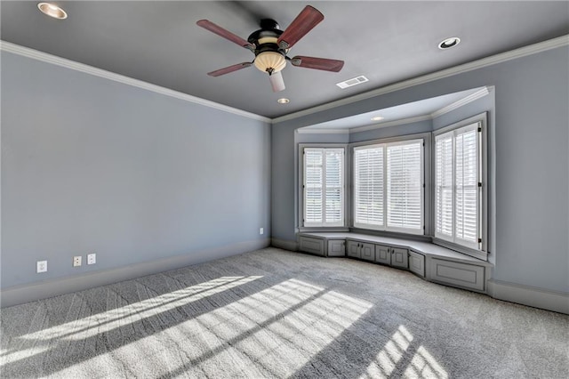 8455 Abingdon Ln, Duluth, GA 30097 - unfurnished room with plenty of natural light, light colored carpet, ceiling fan, recessed lighting, and crown molding