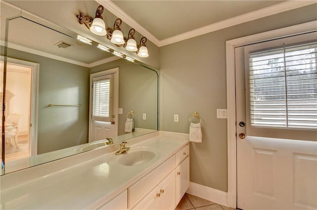 8455 Abingdon Ln, Duluth, GA 30097 - bathroom featuring vanity, tile patterned flooring, healthy amount of natural light, and crown molding