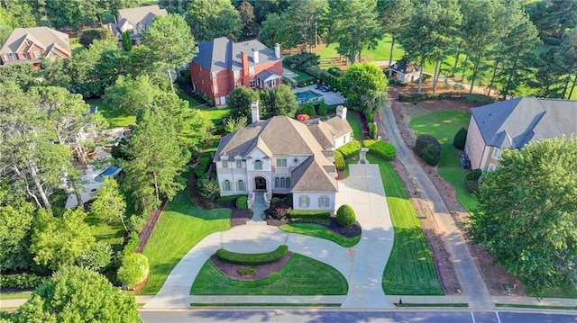 8455 Abingdon Ln, Duluth, GA 30097 - aerial perspective of suburban area featuring a tree filled landscape