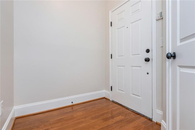 825 Highland Ln NE Unit 1116, Atlanta, GA 30306 - doorway with wood finished floors and baseboards