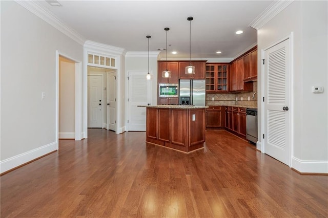 825 Highland Ln NE Unit 1116, Atlanta, GA 30306 - kitchen featuring stainless steel appliances, a center island, tasteful backsplash, dark wood-type flooring, and glass insert cabinets