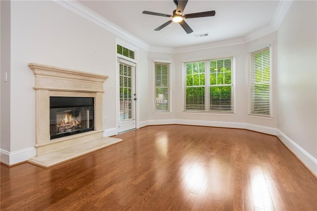 825 Highland Ln NE Unit 1116, Atlanta, GA 30306 - unfurnished living room featuring ornamental molding, wood finished floors, ceiling fan, and a fireplace