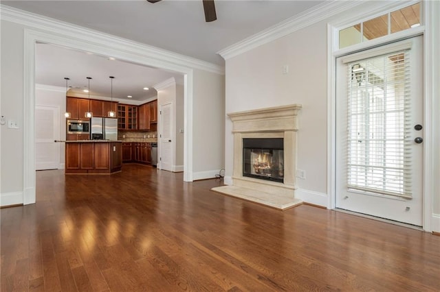 825 Highland Ln NE Unit 1116, Atlanta, GA 30306 - unfurnished living room with ceiling fan, dark wood-style floors, a glass covered fireplace, ornamental molding, and recessed lighting