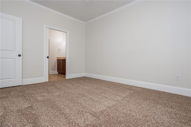 825 Highland Ln NE Unit 1116, Atlanta, GA 30306 - unfurnished bedroom with light colored carpet, crown molding, and connected bathroom