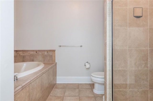 825 Highland Ln NE Unit 1116, Atlanta, GA 30306 - full bathroom featuring a bath, a tile shower, and tile patterned floors