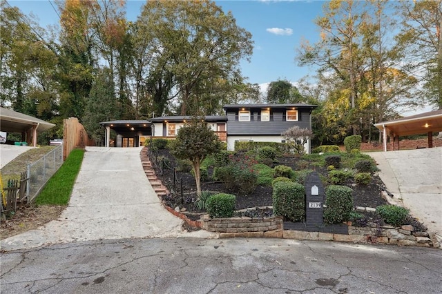 view of front of home with a carport