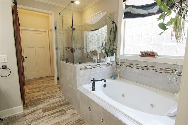 1520 Camden Cove Dr, Cumming, GA 30040 - bathroom with a stall shower, ornamental molding, and a tub with jets