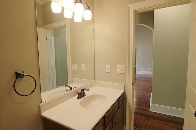 1520 Camden Cove Dr, Cumming, GA 30040 - bathroom with wood finished floors, baseboards, and vanity