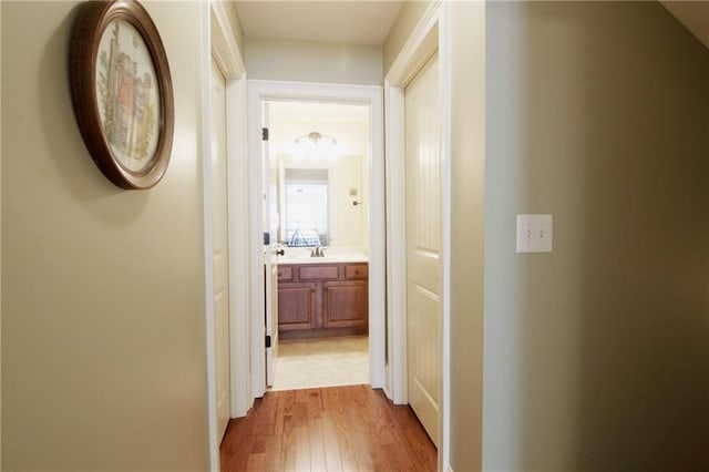 1520 Camden Cove Dr, Cumming, GA 30040 - hall with wood finished floors and a sink