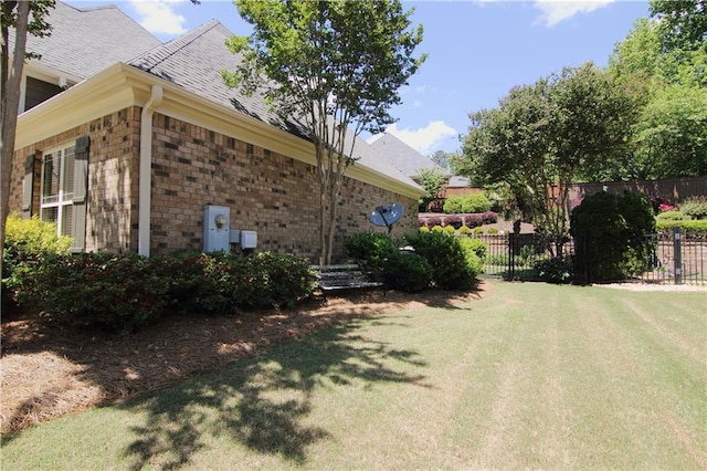 1520 Camden Cove Dr, Cumming, GA 30040 - view of side of home featuring brick siding and a shingled roof