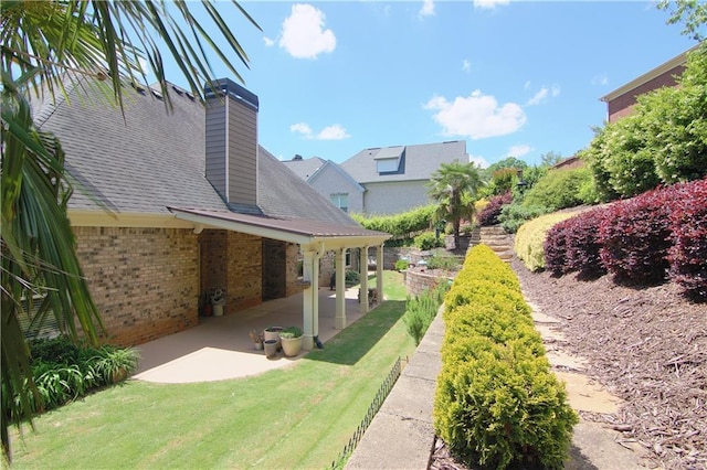 1520 Camden Cove Dr, Cumming, GA 30040 - view of green lawn with a patio