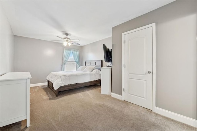 bedroom with carpet and ceiling fan