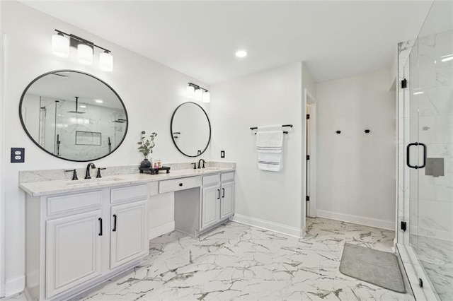 bathroom featuring vanity and a shower with shower door