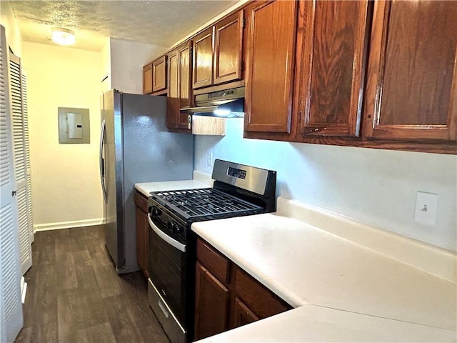 kitchen featuring dark hardwood / wood-style flooring, electric panel, gas stove, and a textured ceiling