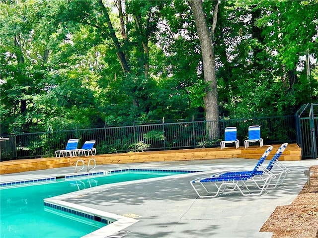 view of pool featuring a patio