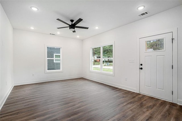 foyer entrance with dark wood-style floors, baseboards, visible vents, recessed lighting, and a ceiling fan