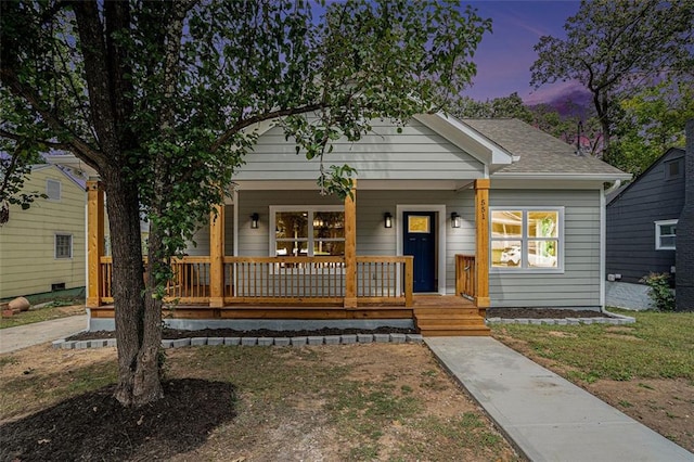 bungalow-style home with a porch