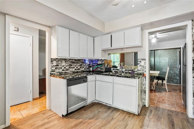 kitchen featuring ceiling fan, sink, white cabinets, and stainless steel dishwasher