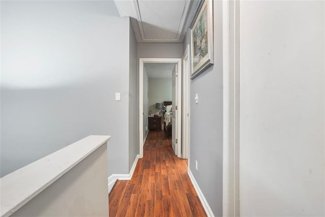 hall with dark wood-type flooring