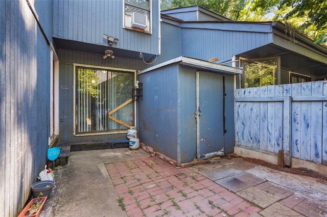 exterior space with a patio area and a shed