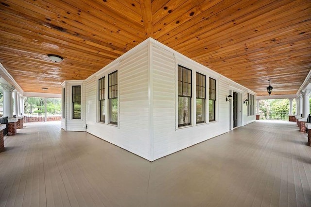 view of property exterior featuring covered porch