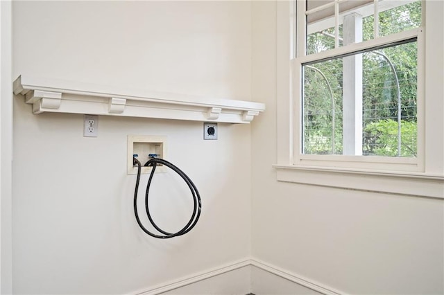 laundry area with hookup for a washing machine and electric dryer hookup