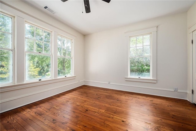 empty room featuring wood-type flooring and ceiling fan