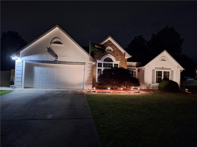 1610 Trellis Xing, Alpharetta, GA 30004 - ranch-style house featuring driveway, a garage, a yard, stone siding, and stucco siding