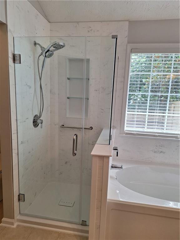 1610 Trellis Xing, Alpharetta, GA 30004 - full bathroom with a bath, a shower stall, and tile patterned flooring