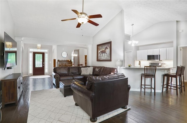 1610 Trellis Xing, Alpharetta, GA 30004 - living area featuring a chandelier, hardwood / wood-style floors, ceiling fan, and high vaulted ceiling